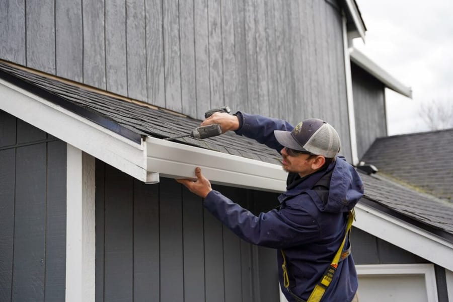 Clean roof and gutters on a residential house